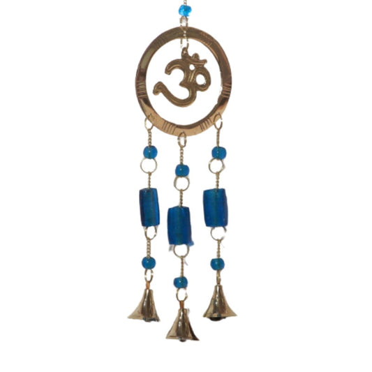 brass wind chime with a central circle and 3 bells suspended on chains from the central circle. aum symbol in the central circle