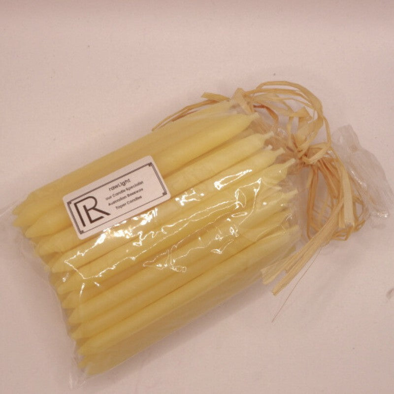 45 beeswax candles in a bag