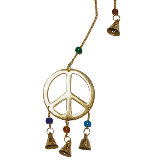 brass bells with peace sign