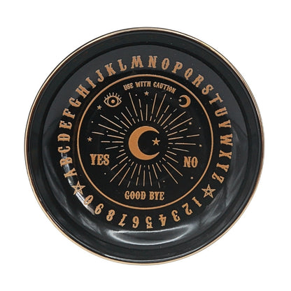 black ceramic dish with letters and numbers on it