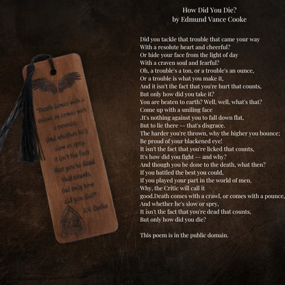 handmade wooden bookmark with black tassel  next to a poem