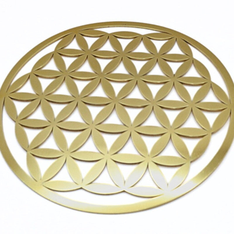 Brass plaque in the symbol of the flower of life