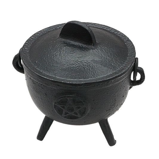 black cauldron with pentacle design on front