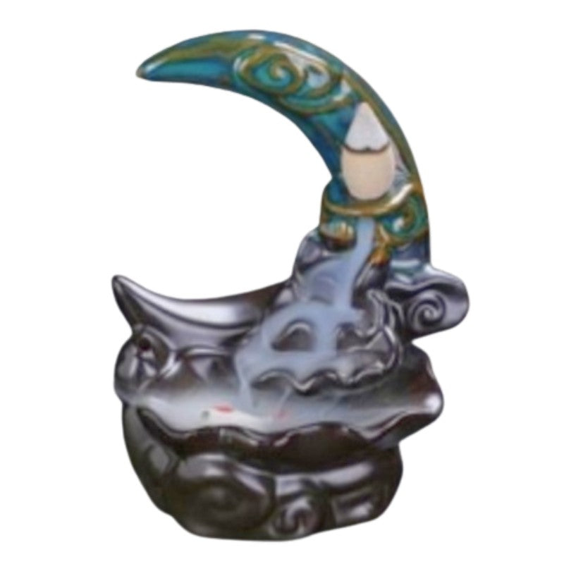 ceramic incense burner in the shape of a crescent moon on a white background