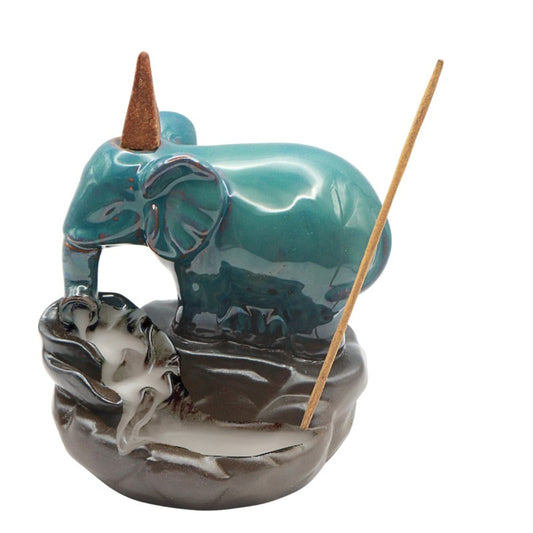 Ceramic elephant incense burner with backflow feature on a white background