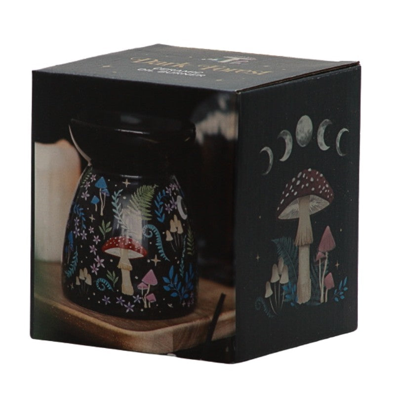 box showing Black oil burner with mushrooms and flowers printed  on it