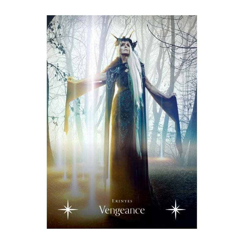 A card featuring a dark fantasy scene of a horned woman in a long gown standing in a misty forest with beams of light. The text 'ERINYES Vengeance' appears at the bottom, with starburst graphics on either side.