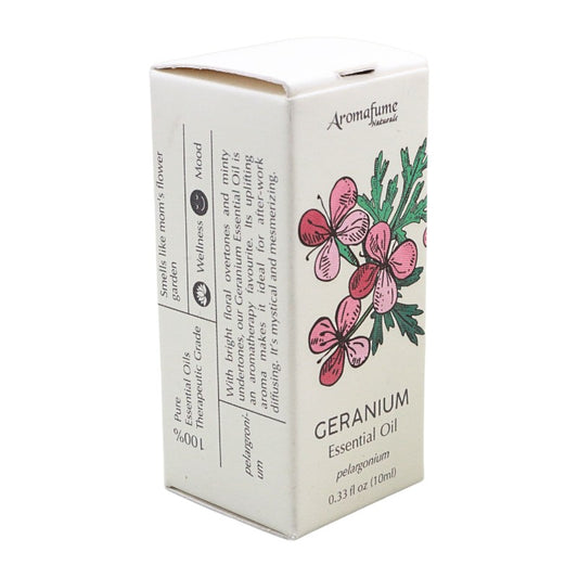 A box of Aromafume Naturals Geranium Essential Oil, featuring a cream-colored packaging box with pink and green geranium flower illustrations and black text.