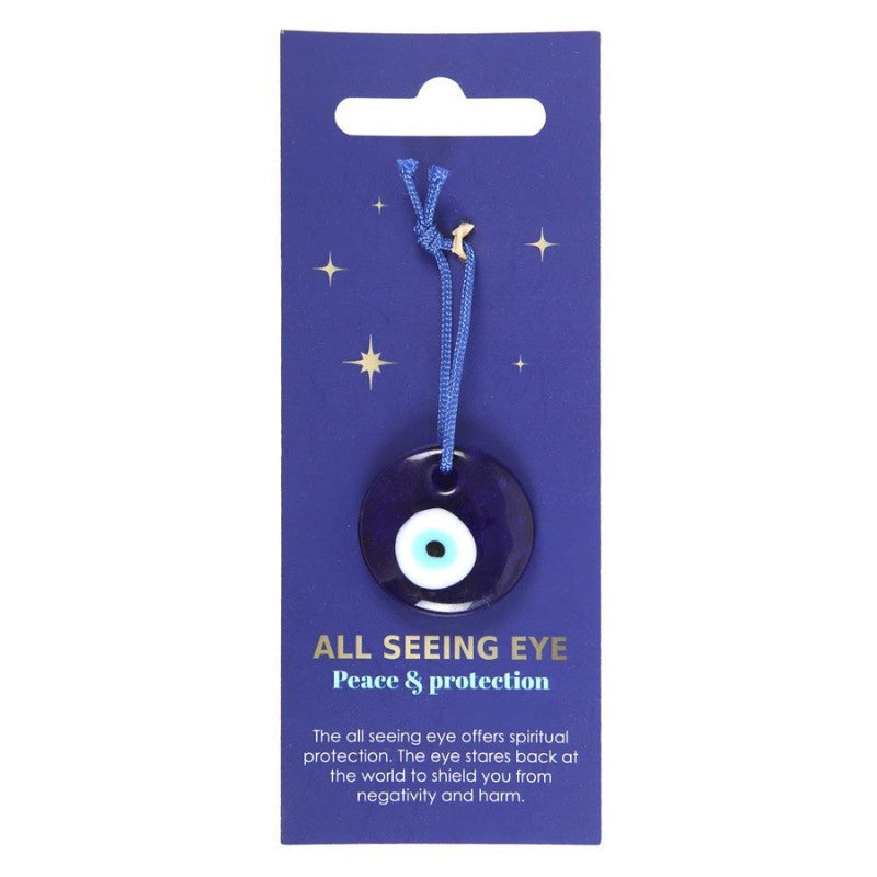 Flat glass bead blue with a white and blue centre to resemble an eye. Hanging from a blue cord on a blue card background