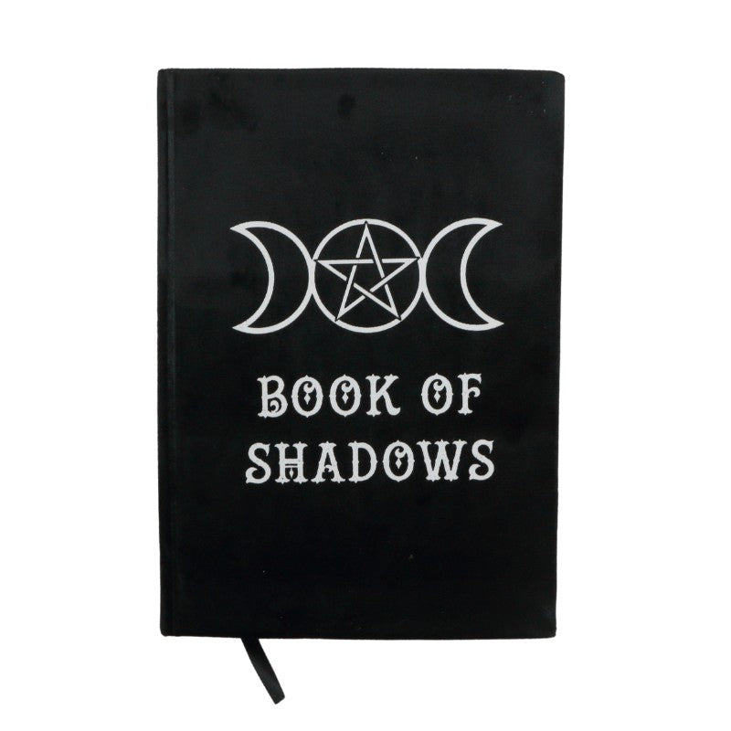 black velvet book of shadows journal with a white triple moon pentacle design on the cover