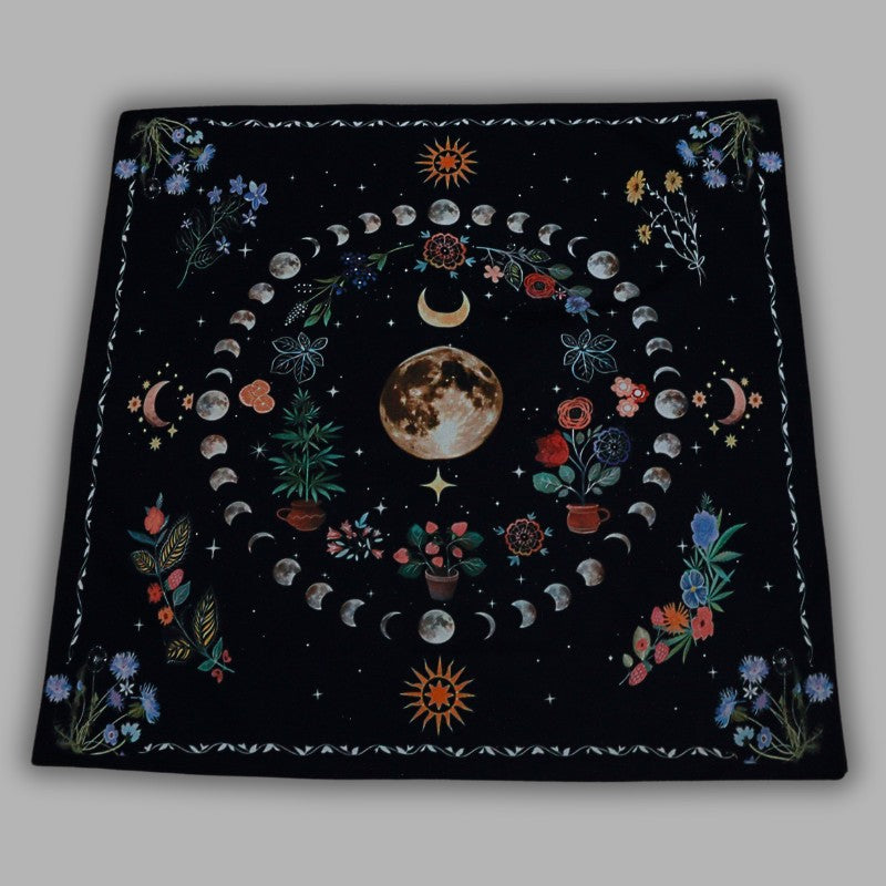 floral tarot cloth showing the moon phases