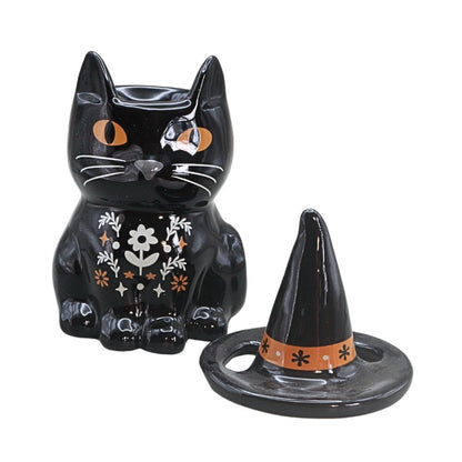 black and orange cat oil burner with folk art floral design, on a white background
