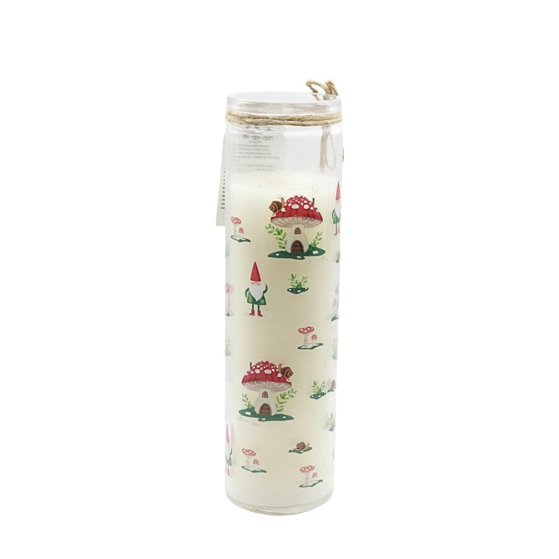 Tall glass candle with gnome illustrations on a white background