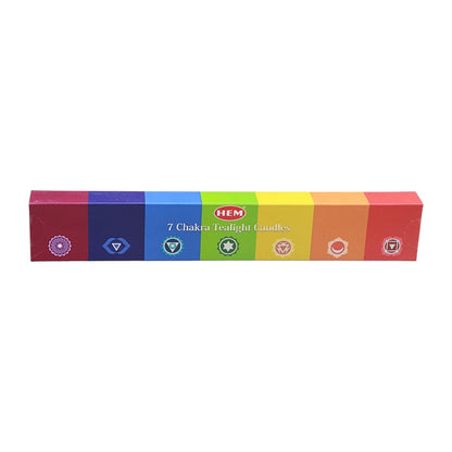 A rectangular box of HEM 7 Chakra Chakra Candles, featuring a rainbow-colored design with chakra symbols on a white background.