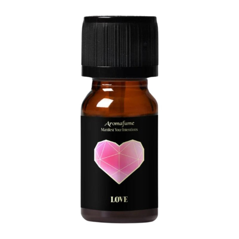 Amber bottle with black lid and a black and pink label on a white background