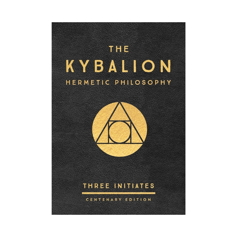 The front cover of 'The Kybalion: Hermetic Philosophy' Centenary Edition, featuring a textured black background with gold lettering and a central golden triangle and circle symbol.
