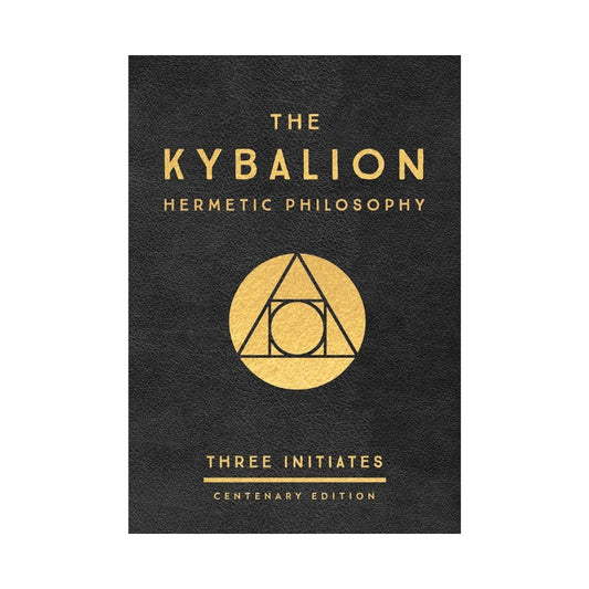 The front cover of 'The Kybalion: Hermetic Philosophy' Centenary Edition, featuring a textured black background with gold lettering and a central golden triangle and circle symbol.
