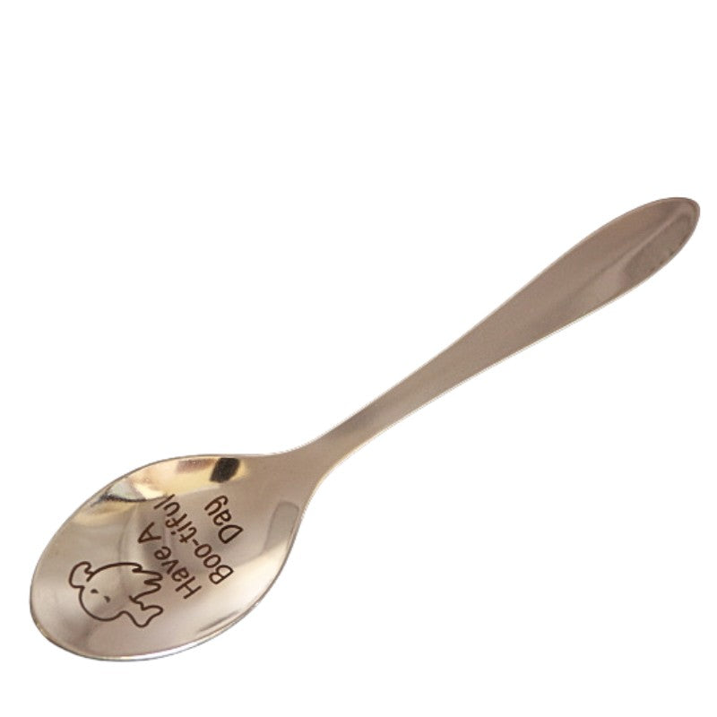 stainless steel teaspoon with "have a boo-tiful day" and a ghost engraved in the dish 