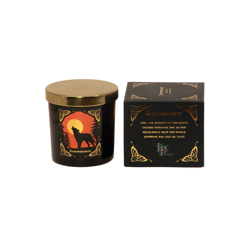 candle gift box-black with orange and gold- featuring a black wolf on front with the word "empowerment" written in gold on top.