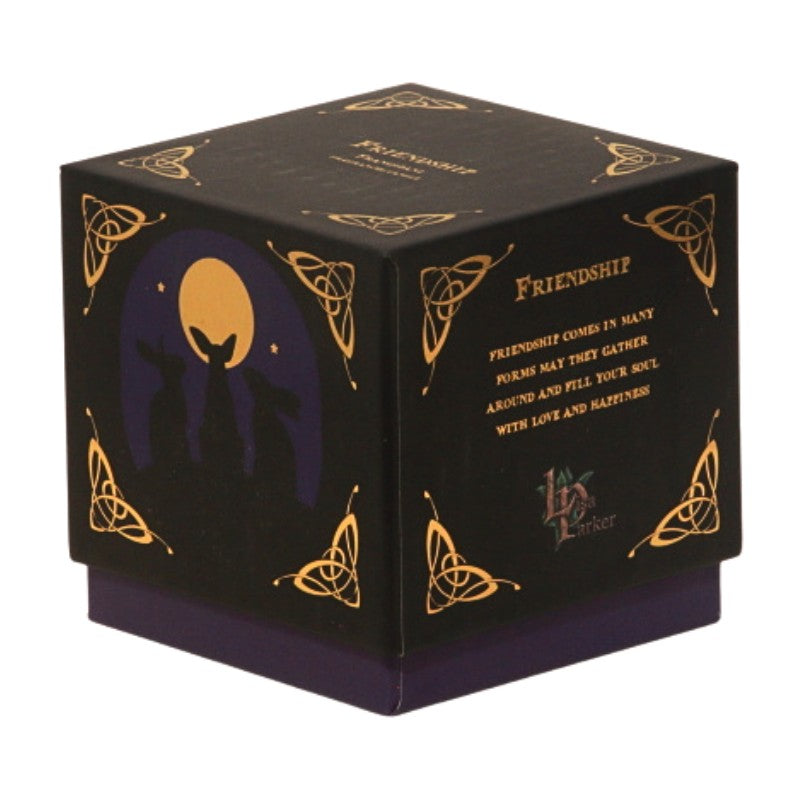 candle gift box-black with blue and gold- featuring 3 hares on front with the word "friendship" written in gold on top.