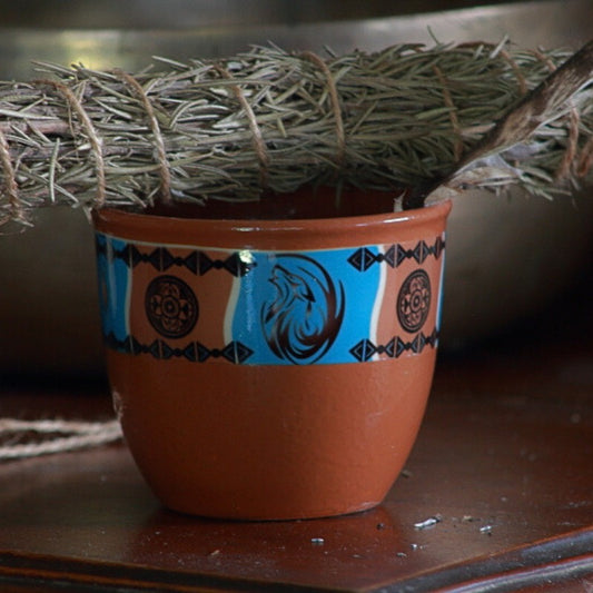 smudge bowl with wolf picture on front with rosemary smudge stick