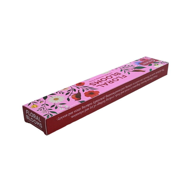 pink packet of incense with bird and floral design and the name "floral blooms" on a white background
