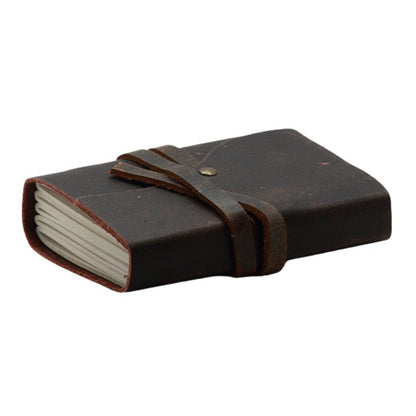 Oiled leather journal with a leather strap