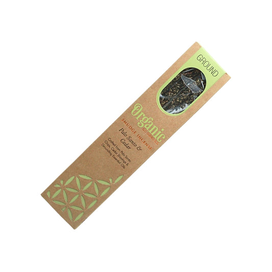 Organic Goodness Ground Palo Santo & Cedar smudge incense in a brown box with cream detailing and a window showing the sticks.
