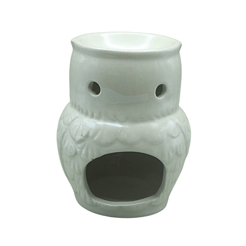 back of a white ceramic oil burner in the shape of an owl on a white background