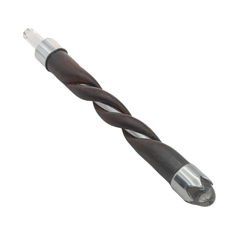Twisted wooden wand with metal inner tube and clear quartz tip and end on a white background
