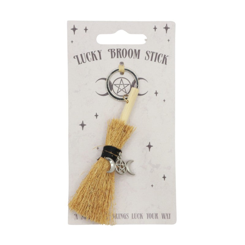 keyrings with tiny broomstick attached, with a black string and a pentacle charm with two crescent moons, outward facing, on each side