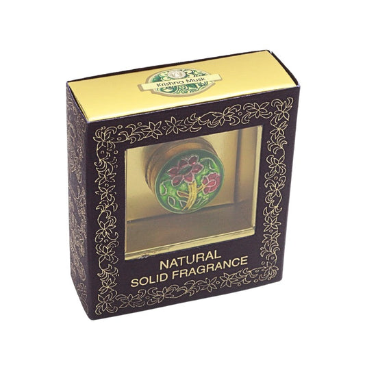 Boxed natural solid fragrance with floral design on a white background