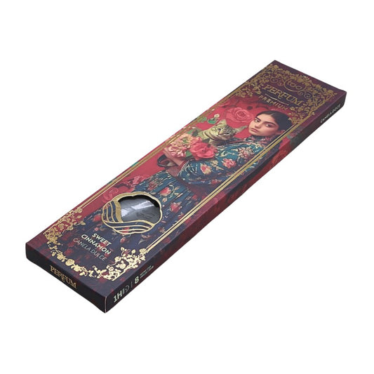 Perfume incense box with floral design and face on a white background