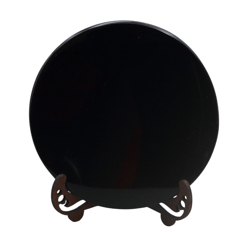 black obsidian scrying mirror on stand