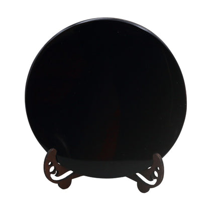 black obsidian scrying mirror on stand
