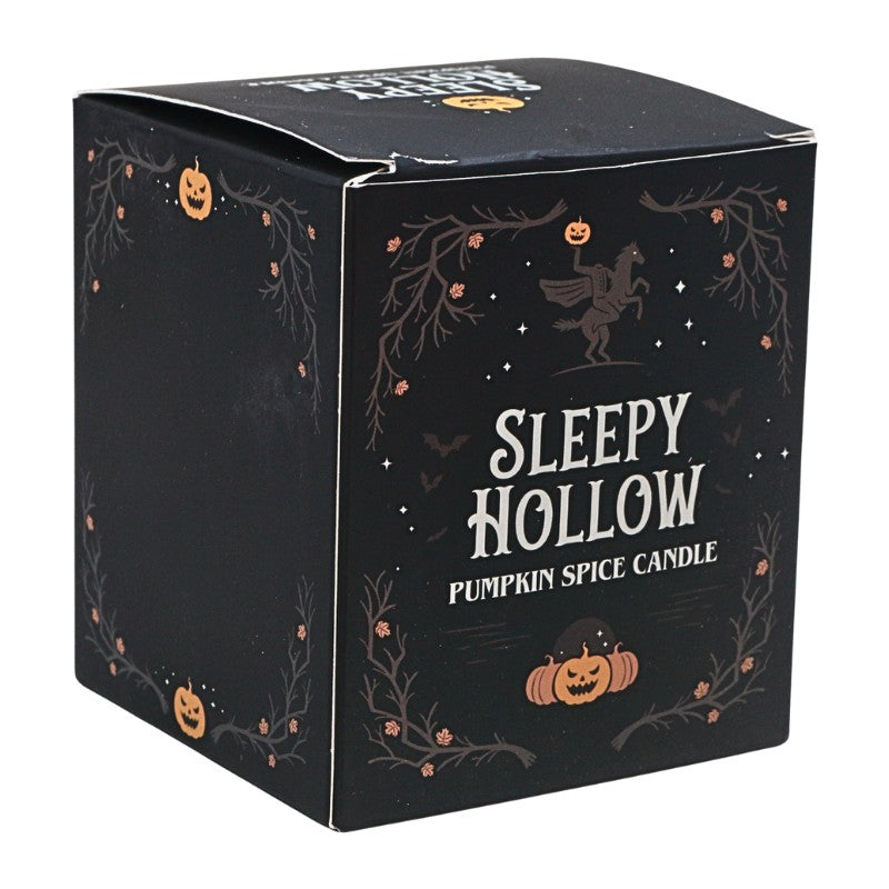 Black candle packaging with white and orange designs