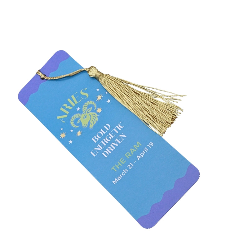 blue book mark with gold tassel and yellow and white writing 
