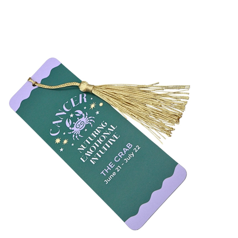 green and purple bookmark with gold tassel and white and purple writing, on a white background