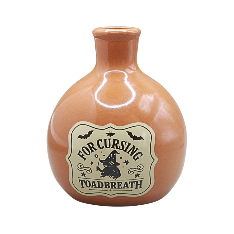 orange coloured ceramic bottle with a tapered neck and old style vintage label that reads "for cursing toadbreath"