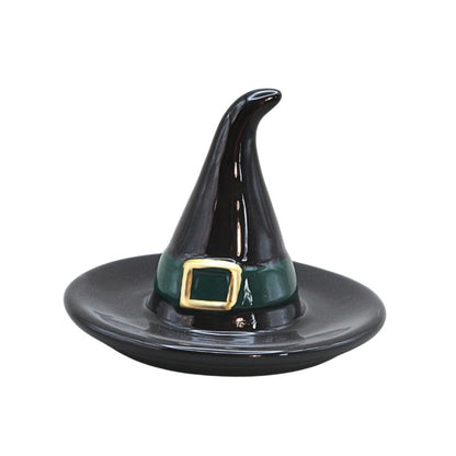 Black ceramic witches hat on a white background
