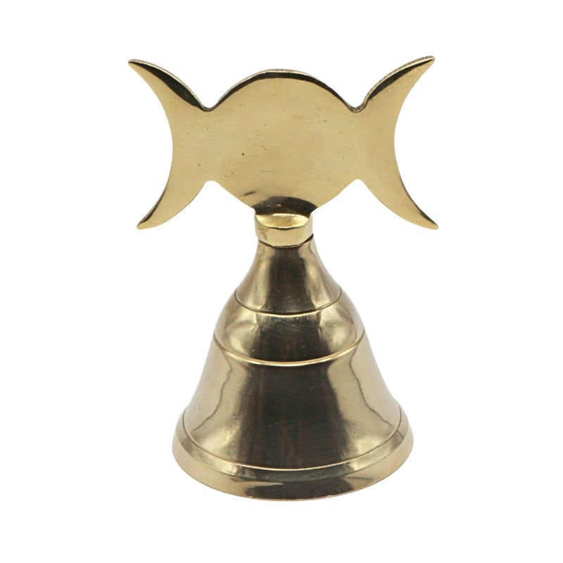 Brass bell with triple moon sign design on a white background