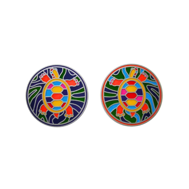 Two round stickers featuring a colourful turtle design on a white background.

