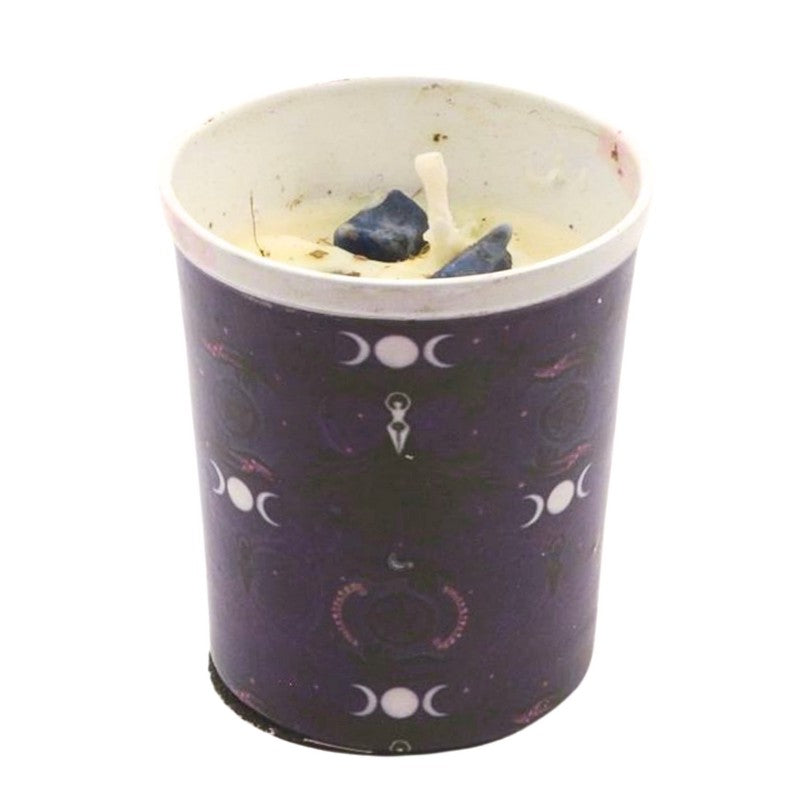 Candle in a purple container with moon phase design on a white background