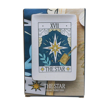 Tarot card design with 'The Star' card and a ceramic trinket dish on a white background
