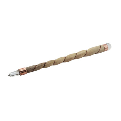 Twisted wooden stick with copper and quartz ends on a white background