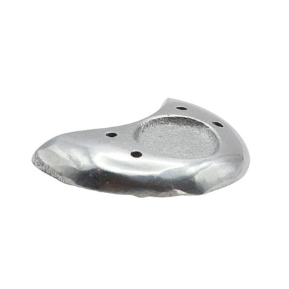 Metallic incense holder in a crescent  moon shape  on a white background
