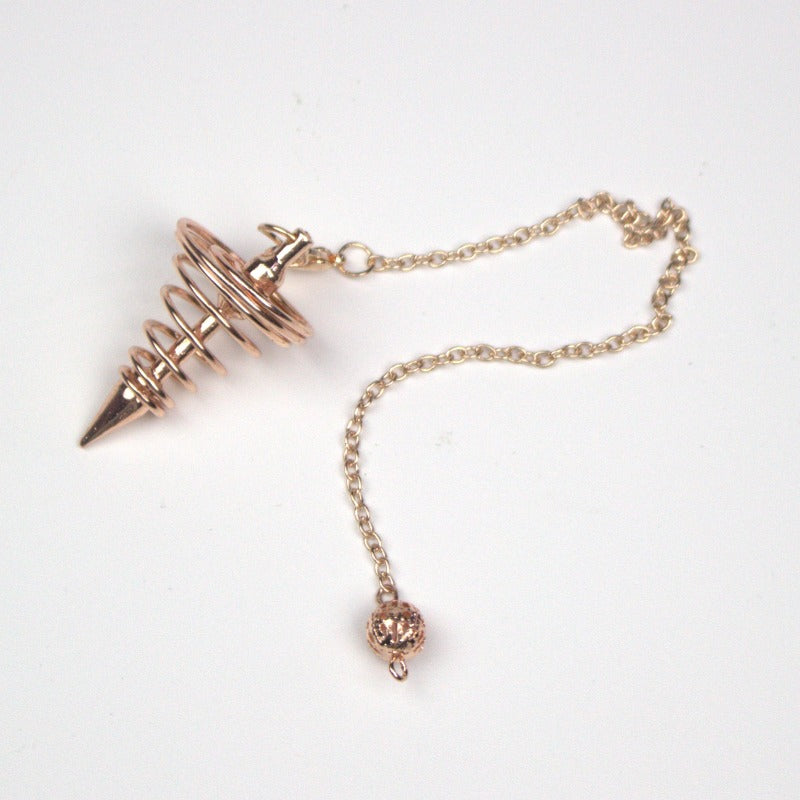 rose gold spiral pendulum on white background