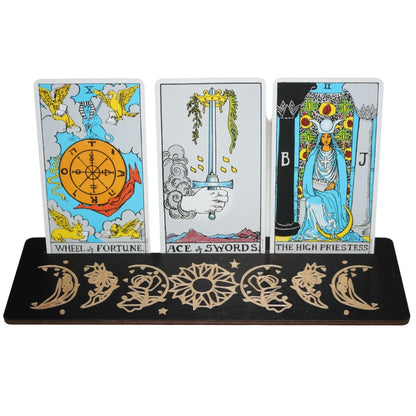 3 tarot cards in a black tarot card holder