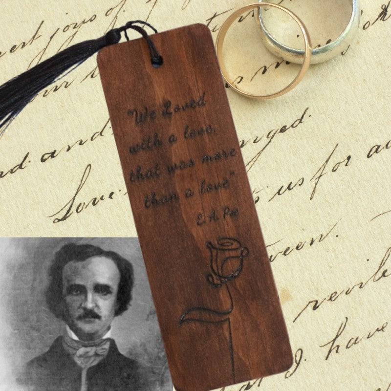 handmade bookmark on a love poem with wedding rings and picture of edgar allen poe