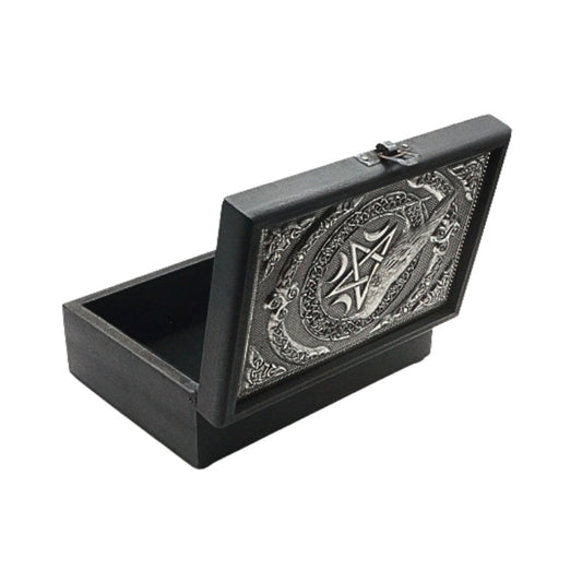 Black jewelry box with silver pentagram and raven design on a white background